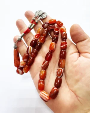 Red banded agate cylinder prayer beads Dubai