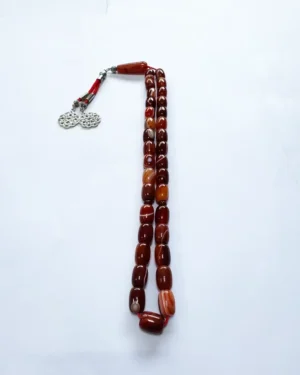 Red banded agate cylinder prayer beads Dubai